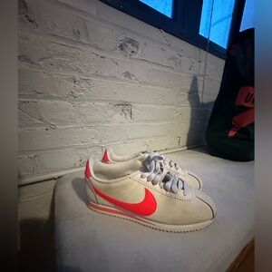 Slightly used Orange and Tan Nike Women’s Cortez Walking Shoes